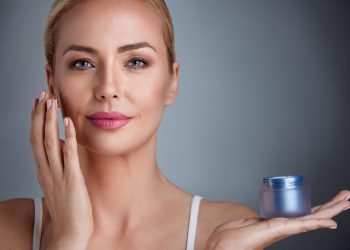 Beautiful,Nourished,Woman,Holding,Cream,For,Her,Skin
